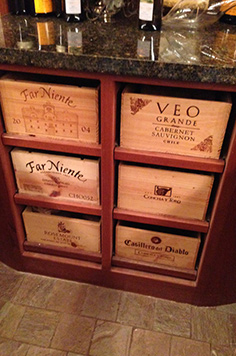 wine bottles, wine cellar, granite top, import wine, french wine, box of wine, aabc wine cellar, stacks of wine, custom granite top, expensive wine
