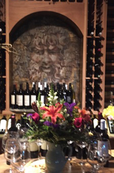custom wine cellar, home wine cellar, greek god, pagan god, red wine, flowers vase, wine glass, wine storage, home wine storage, aging wine